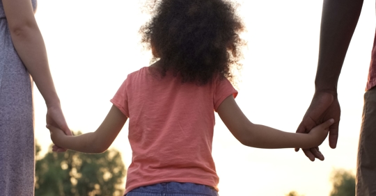 A happy family walking together