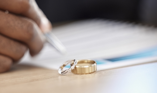 rings and signature on paperwork for a lawyer