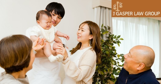 family having fun together with a newborn