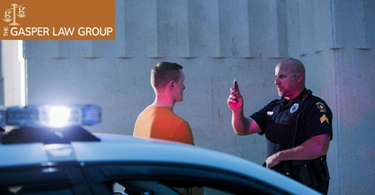 man doing a sobriety test at the side of the road