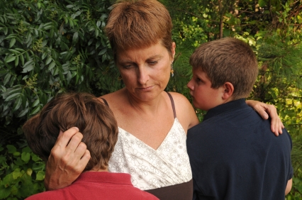 mother holding children