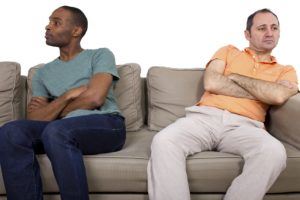 Interracial gay couple going through relationship problems